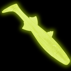 A glow in the dark soft plastic fishing lure shaped like a realistic fish, shown against a solid black background.