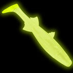 A glow in the dark soft plastic fishing lure shaped like a fish, shown against a solid black background.